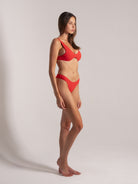 Ocean Mystery red deep-V bikini set with low-rise bottoms - athletic fit swimwear.