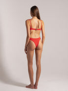 Ocean Mystery red high-cut bikini set with adjustable straps - athletic fit swimwear.