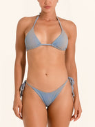Cheeky fit denim blue bikini bottom with string ties.