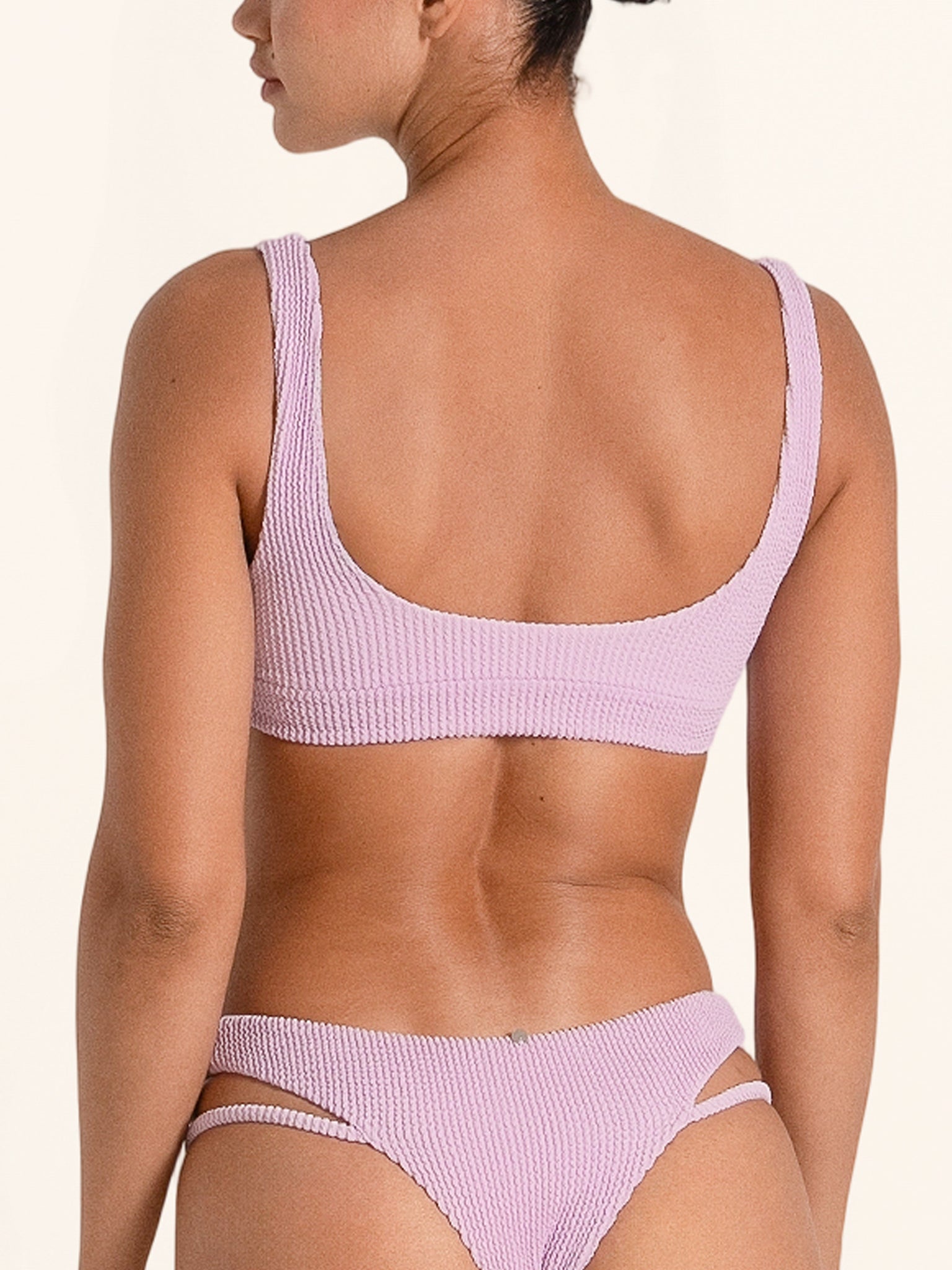 Chic lilac bikini top perfect for beach swimwear.