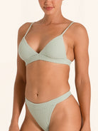 Chic mint green triangle bikini top with soft fabric.