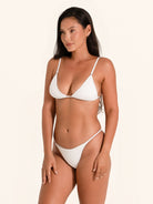Classic white minimal bikini bottom with tie sides.