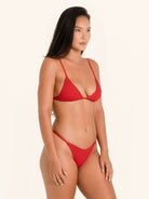 Crimson bikini top in a classic triangle style for beach days.