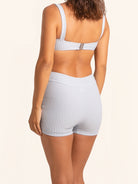 Grey blue bikini shorts in textured fabric with modern design.
