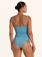 Light blue drawstring one piece swimwear with flattering ruched design.