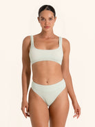 Light green square neck bikini top with wide straps for secure fit.