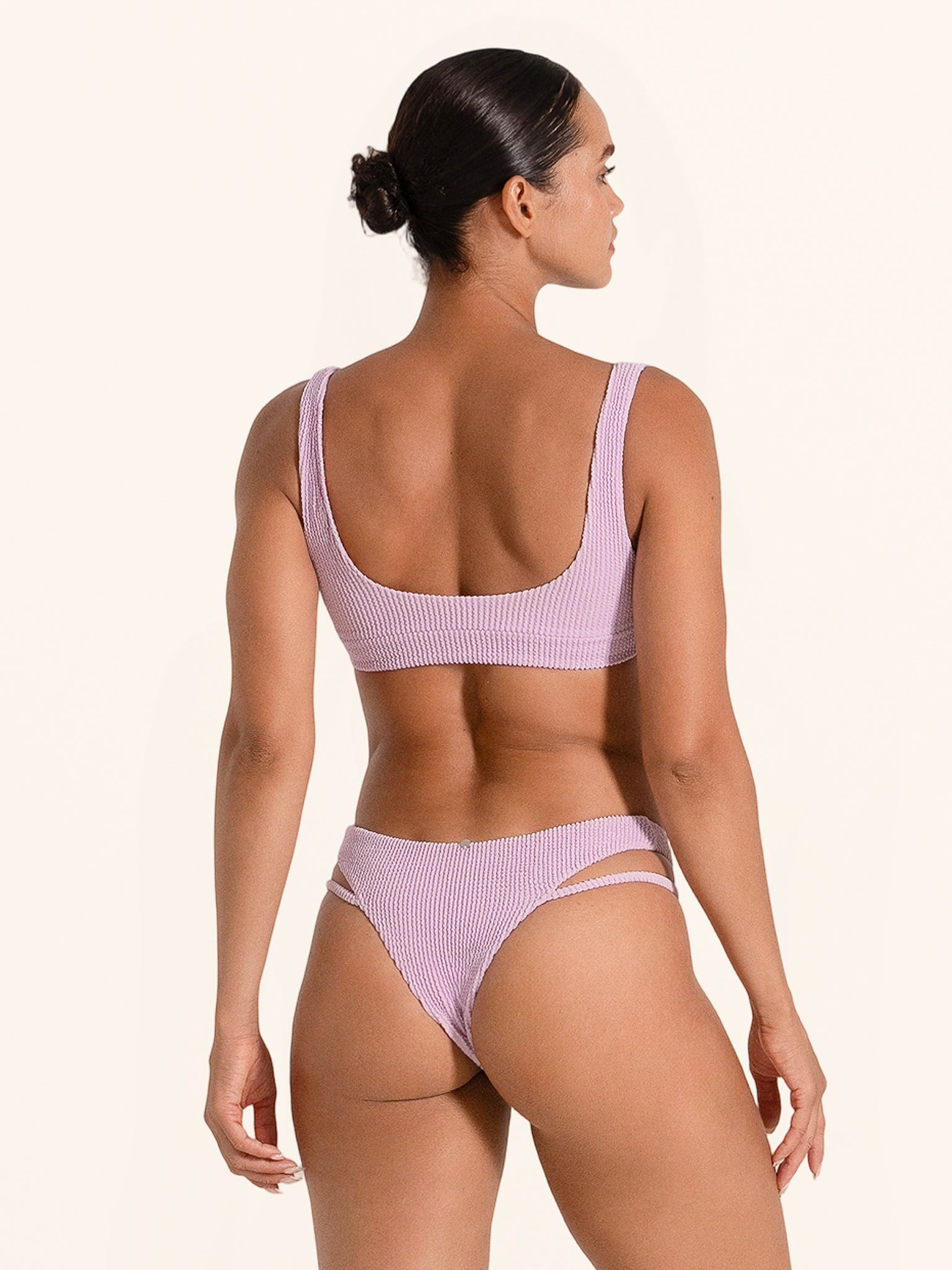 Lilac high neck bikini top with modern fashion style.