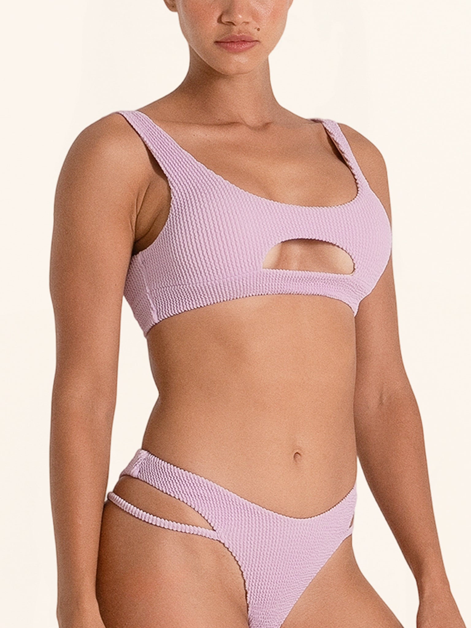 Stylish lilac swimwear top designed for women.