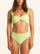 Front view of neon green high-waist bikini bottom with textured fabric.