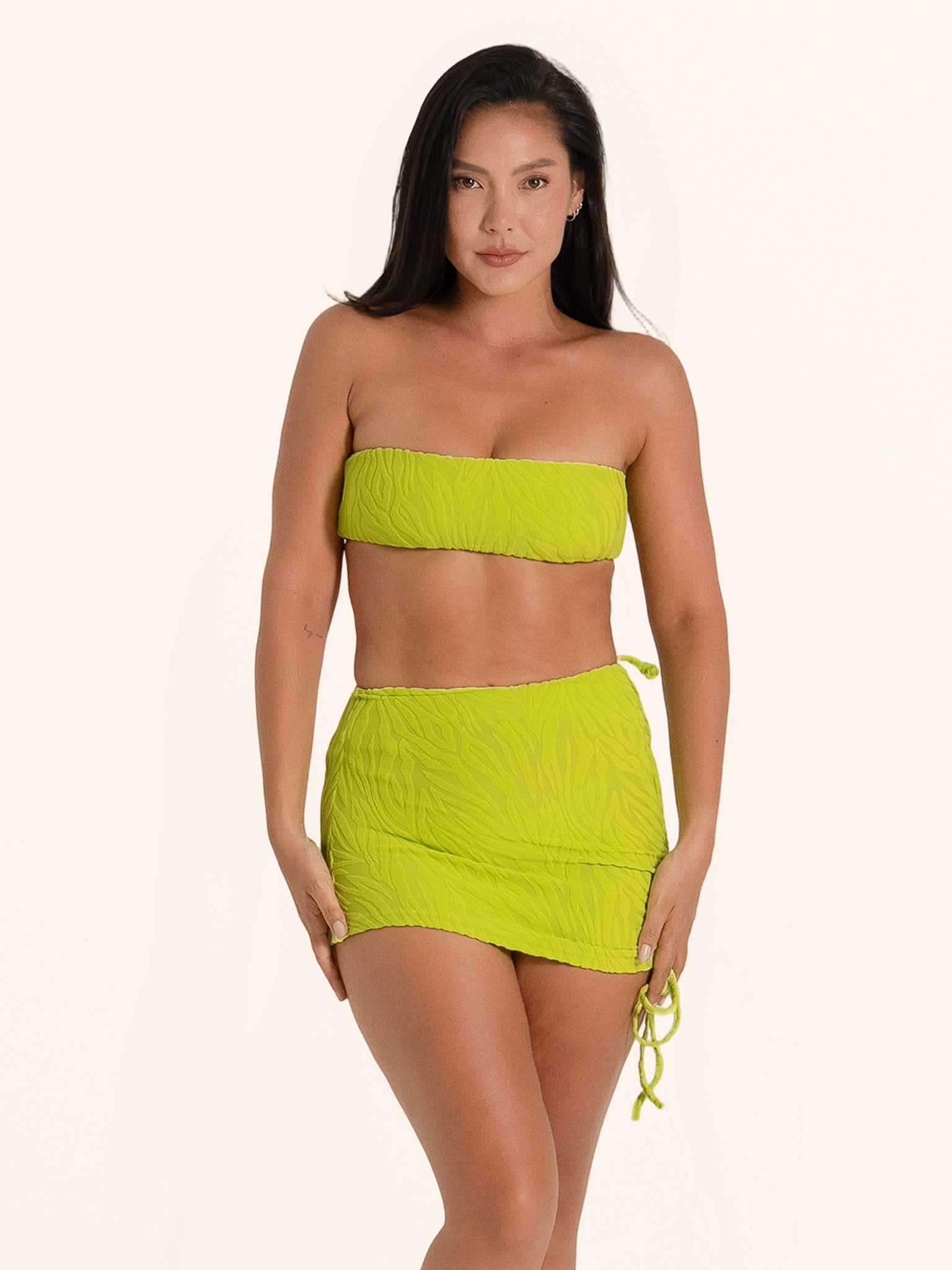 Neon green skirted bikini bottom with side tie detail.