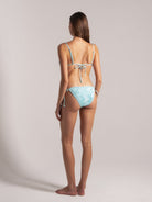 Model wearing sky blue ribbed bikini front side by Ocean Mystery Swimwear - sustainable textured fabric