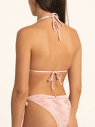 Back view of Ocean Mystery pink textured bikini top with tie closure.