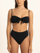 Front view of Ocean Mystery black high waist bikini bottom with sleek finish.