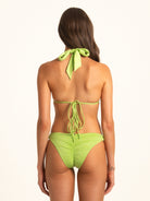 Side look of Ocean Mystery green bikini bottom with flattering cut