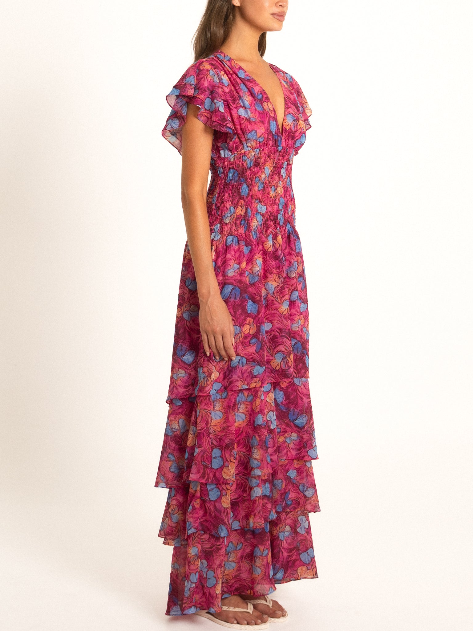 Ocean Mystery red and purple floral tiered maxi dress designed for summer elegance and movement.