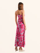 Back view of pink floral maxi dress with slim adjustable straps