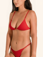 Sleek red triangle bikini top with a flattering silhouette.