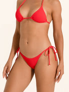 Bright red swim bikini bottom with adjustable side ties.