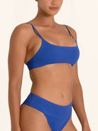 Sporty bikini top in royal blue with fixed straps.