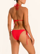 Back angle of red tie side bikini bottom showing cheeky coverage and tie straps.