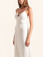 Closeup front of white midi dress with keyhole neckline