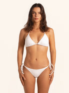 White triangle swim top featuring simple clean design.