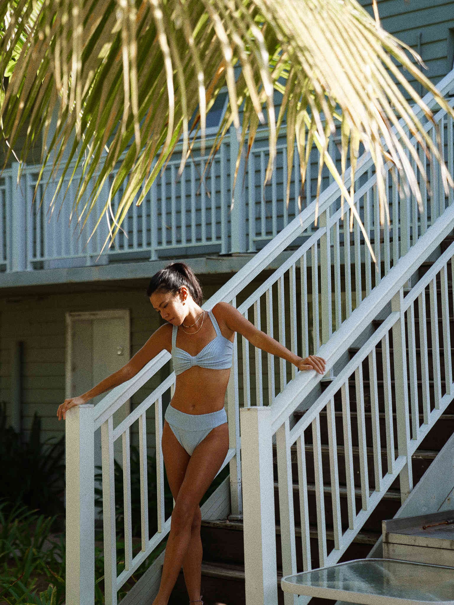A Girl Wearing Bikini Set On Stair