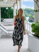 A Women Wearing Black & White Geometric Print Halter Dress - OCEAN MYSTERY
