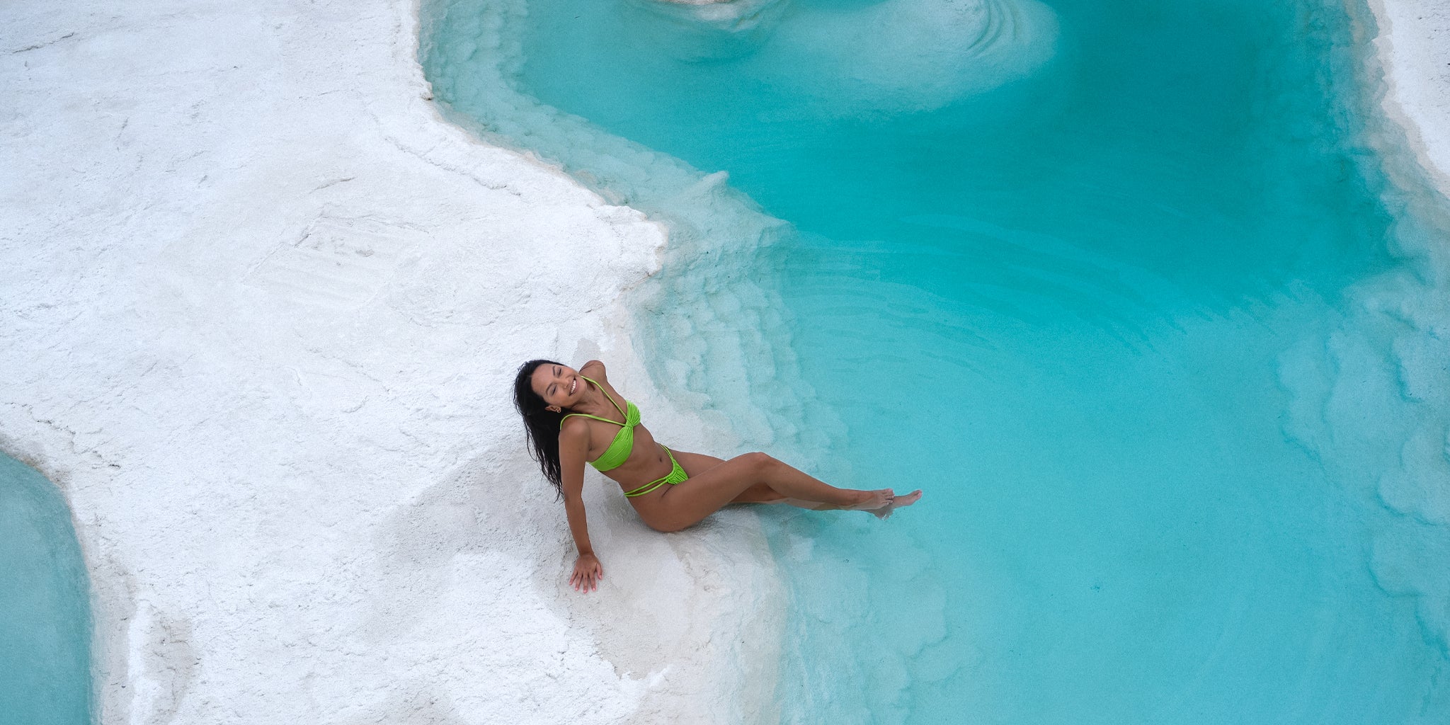 A Girl Wearing Kelly Green Bikini on the pool side