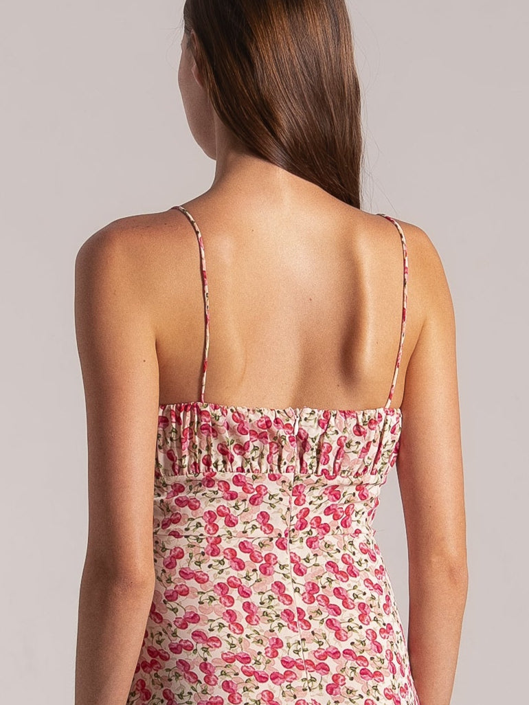 Ocean Mystery pink and green floral midi dress with spaghetti straps, ruched bodice and tiered hem.