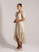 Ocean Mystery white floral midi dress with V-neck, puff sleeves and high-low hem - feminine botanical print.