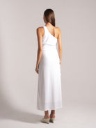 Ocean Mystery white one-shoulder maxi dress with cinched waist - elegant back view with wedge heels.