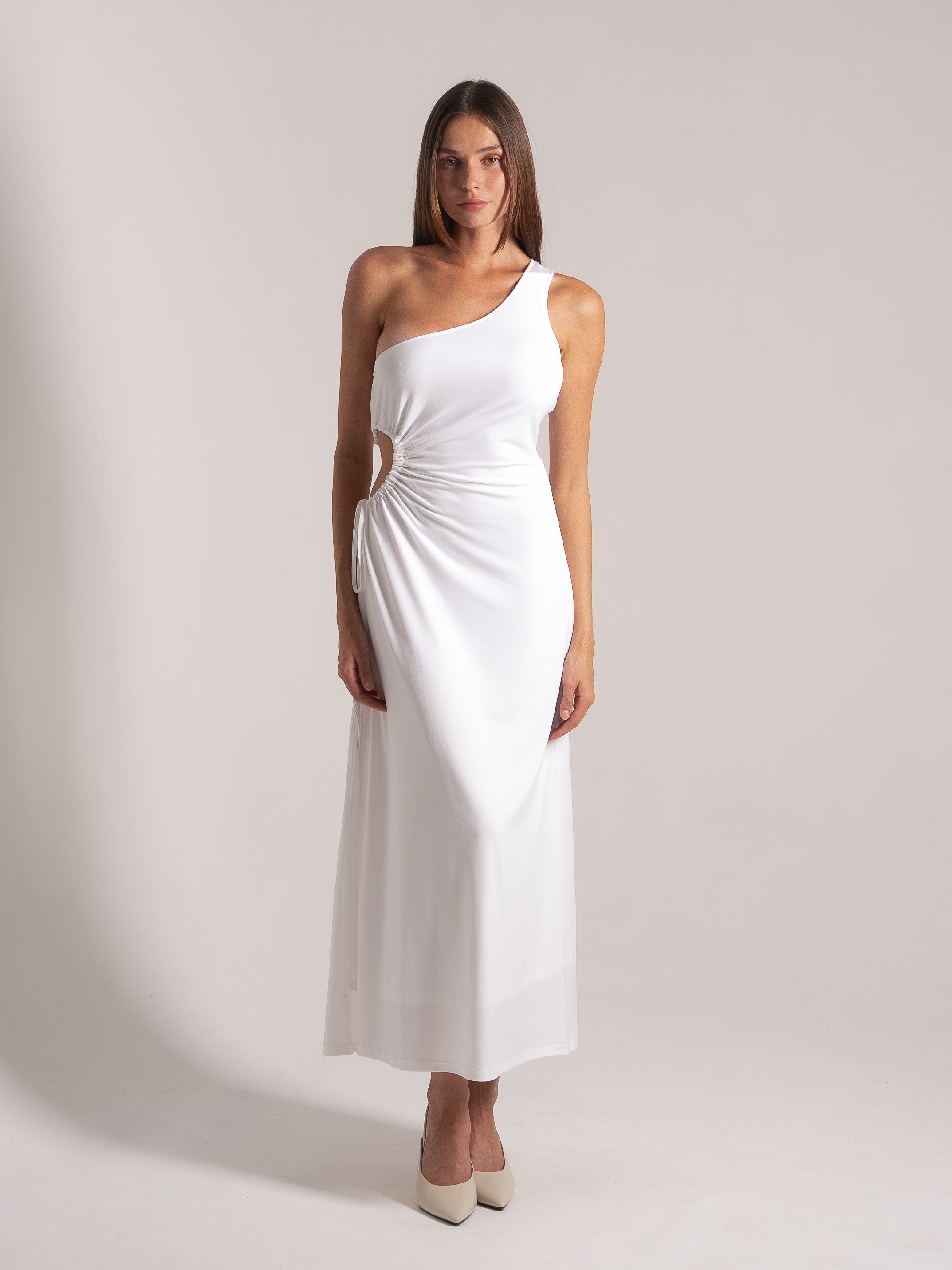 Ocean Mystery white one-shoulder maxi dress with side cutout - floor-length elegance with cream heels.