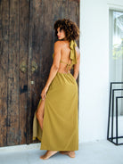 Sophisticated Mustard High-Slit Dress – Halter Neck Tie and Symmetrical Cutout Detail