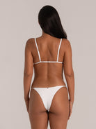 Back view of adjustable white bikini top with shoulder straps and minimal design