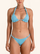 Aqua bikini bottom matching halter set in minimal cut.