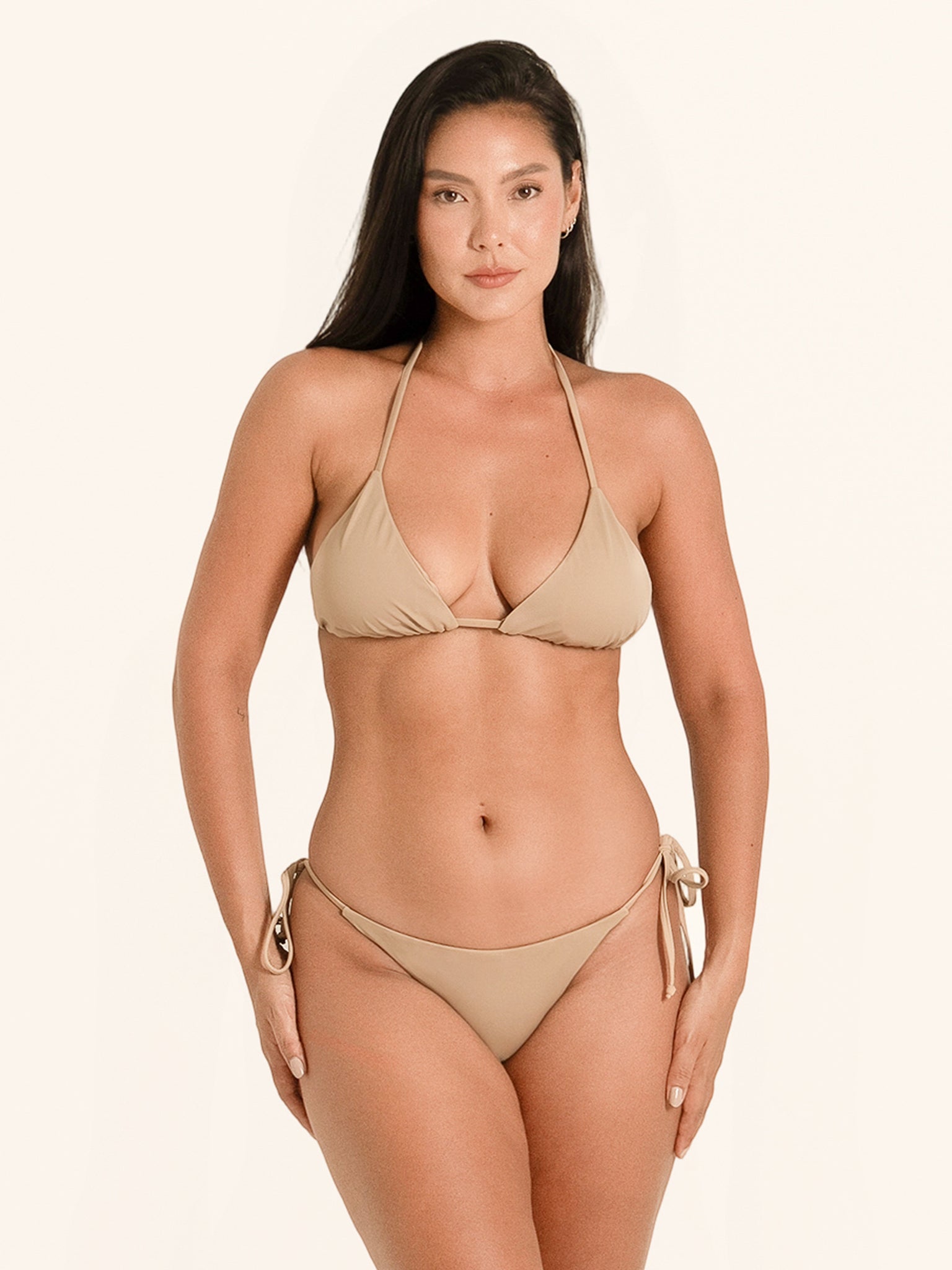 Classic beige swimwear top in triangle cut with soft texture.