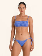 Blue bandeau bikini top in tie dye style with thin straps.