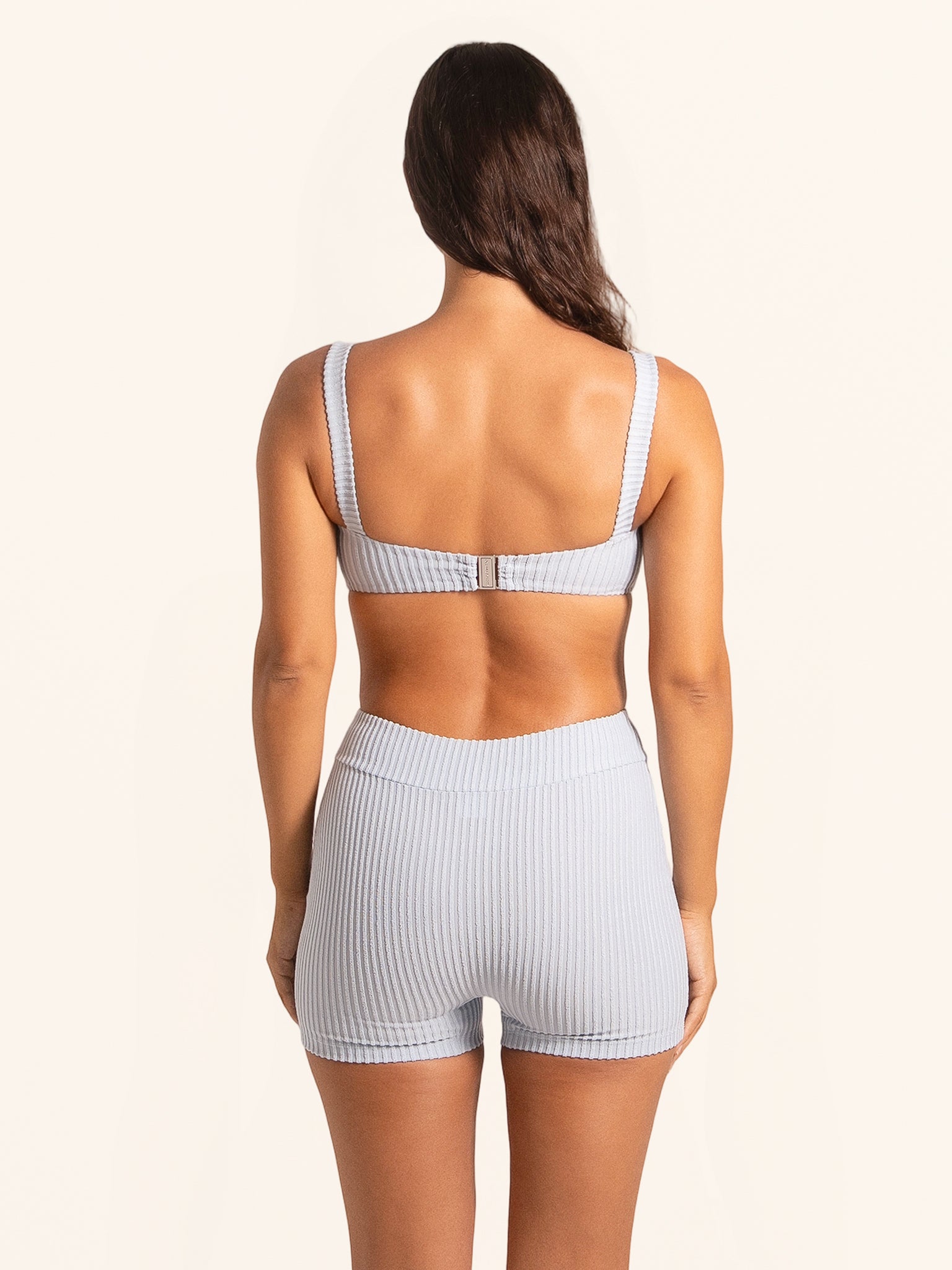 Blue bikini shorts designed as a chic swim bottom style.