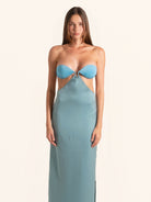 Front view of blue green strapless cut out maxi dress with ring detail