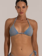 Close-up front view of a blue-grey triangle bikini top with adjustable ties.