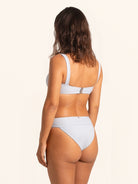 Blue striped swimwear bottom designed for a flattering beach look.