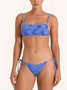 Blue tie side bikini bottom in trendy tie dye style.