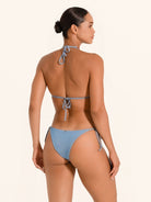Chic denim blue triangle bikini top with textured fabric.