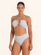 Chic light blue bandeau swim top with cutout lace-up detail.