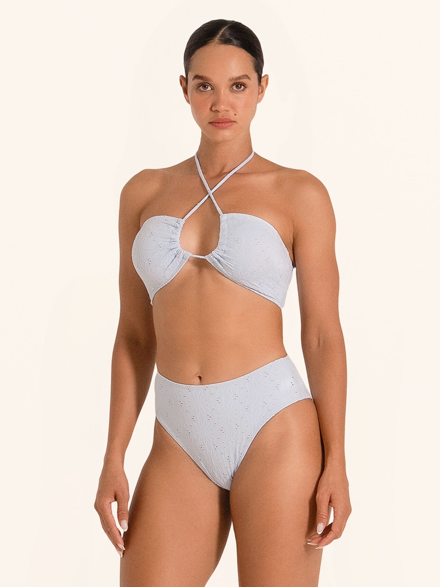 Chic light blue bandeau swim top with cutout lace-up detail.