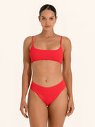 Chic red bikini top with simple modern fit.