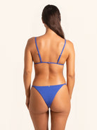 Cobalt blue bikini bottom crafted from stretch swim fabric for comfort.