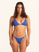 Cobalt blue bikini top in classic triangle swimwear style.