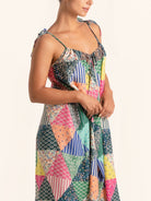 Side angle look of colorful patchwork maxi dress with relaxed fit